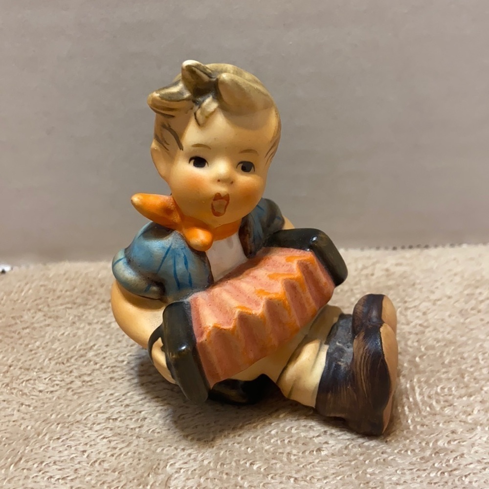 Goebel Hummel “Boy with accordion ” Figurine
